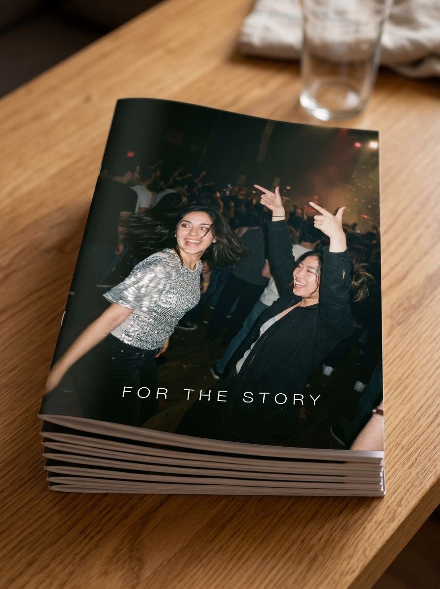 A stack of printed zines on a table